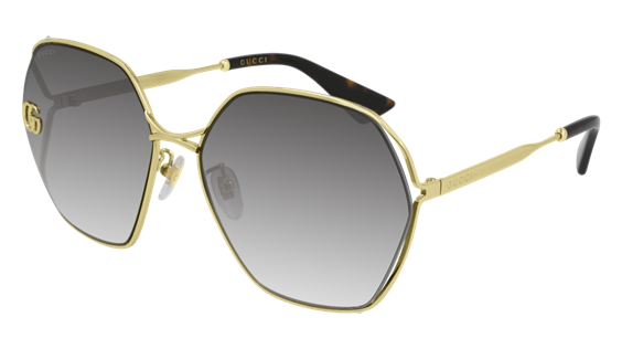 Gucci sunglasses outlet with gold arms